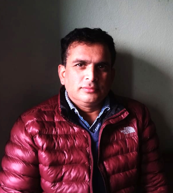 Dr. Laxuman Sharma